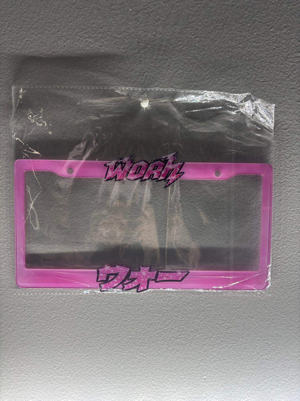 “Woah” plate frame