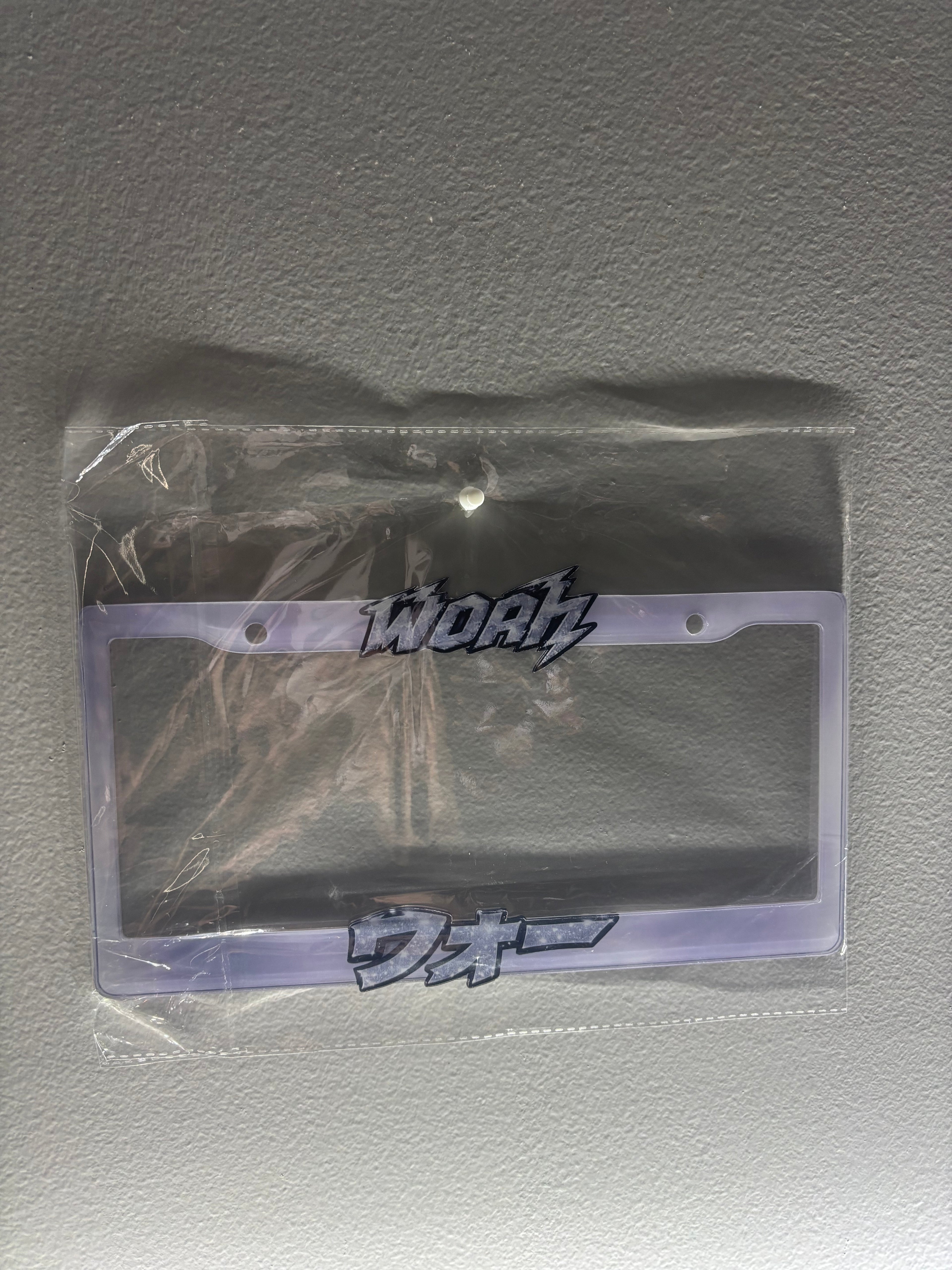 “Woah” plate frame